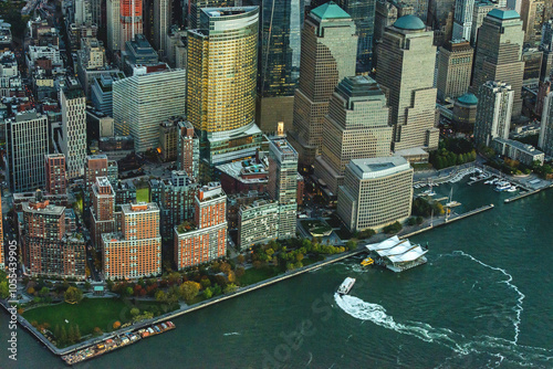 Aerial view of vibrant cityscape with modern skyscrapers and bustling waterfront, New York, United States. photo