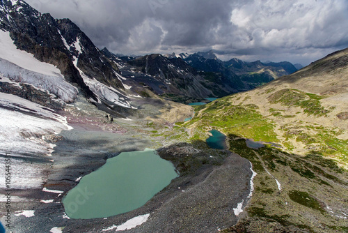 Aerial view of breathtaking Multinsky lakes surrounded by majestic mountains and dramatic sky, Altai republic, Russia. photo