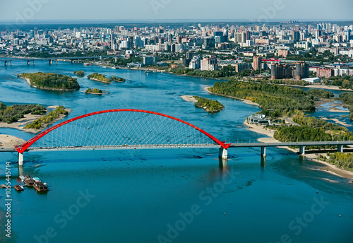Aerial view of bugrinsky bridge over ob river with beautiful cityscape, Novosibirsk, Russia.