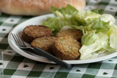 Vegetable protein burger with broccoli, zucchini and carrots - homemade with pea flour - vegetarian product photo