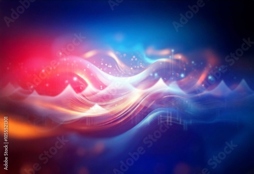 Abstract image of glowing orange and blue lines, creating flowing, wavy patterns on a dark background.