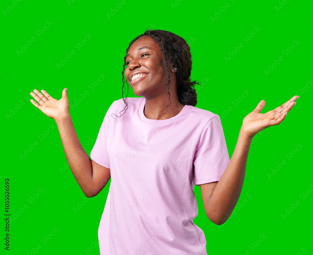 A young woman in casual attire smiles playfully with hands raised in a questioning gesture against a bright green background A young woman in casual attire smiles playfully with hands raised in a questioning gesture against a bright green background