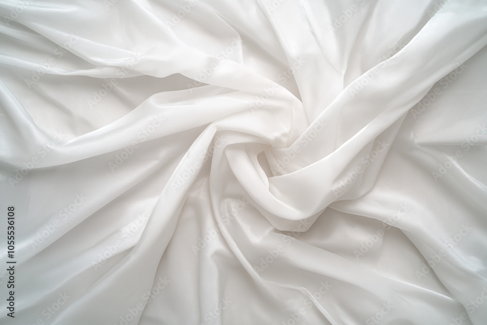 Flowing white fabric twisted into soft folds, elegant and refined texture