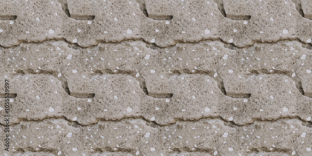 A close-up of stone with slight erosion, with scattered white flecks on a light gray base A close-up of stone with slight erosion, with scattered white flecks on a light gray base