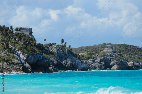 Mayan ruins overlook turquoise Caribbean waters in Tulum, Mexico.