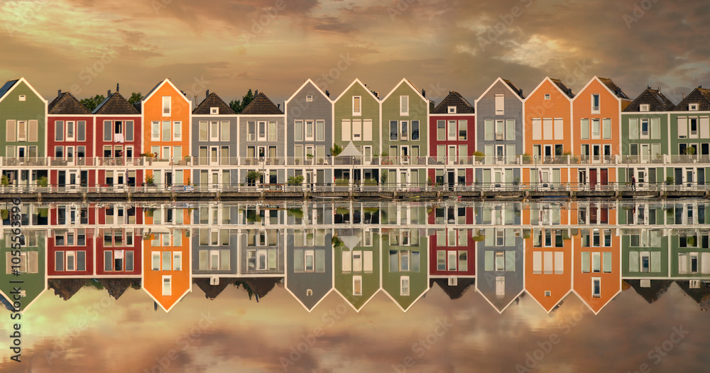 Reflection with houses on the lake in Houten Netherlands