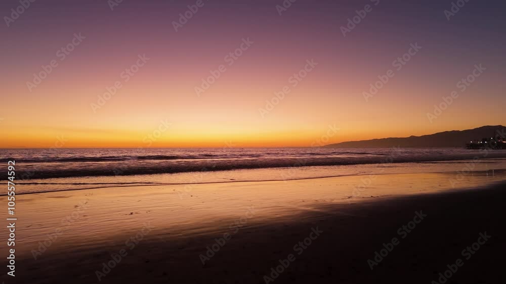 Experience the stunning sunset over a tranquil beach as dusk settles into the horizon Experience the stunning sunset over a tranquil beach as dusk settles into the horizon