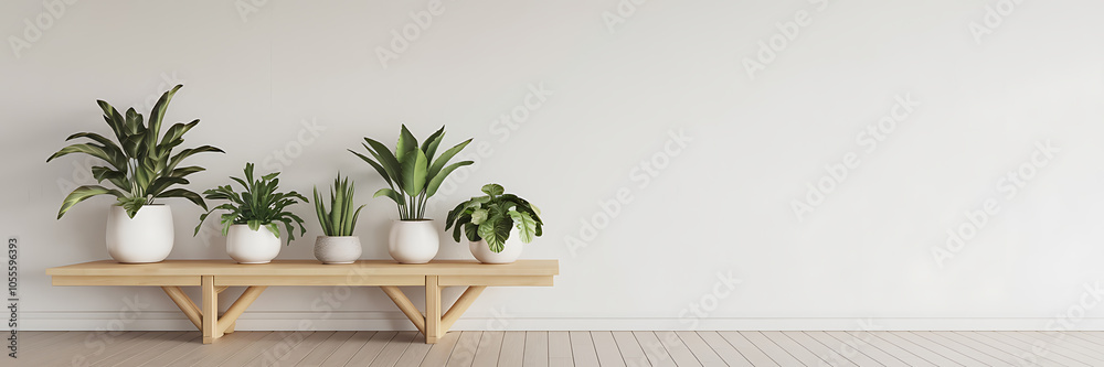 Minimalist interior design with green plants and white pots on a wooden shelf against a white wall Minimalist interior design with green plants and white pots on a wooden shelf against a white wall