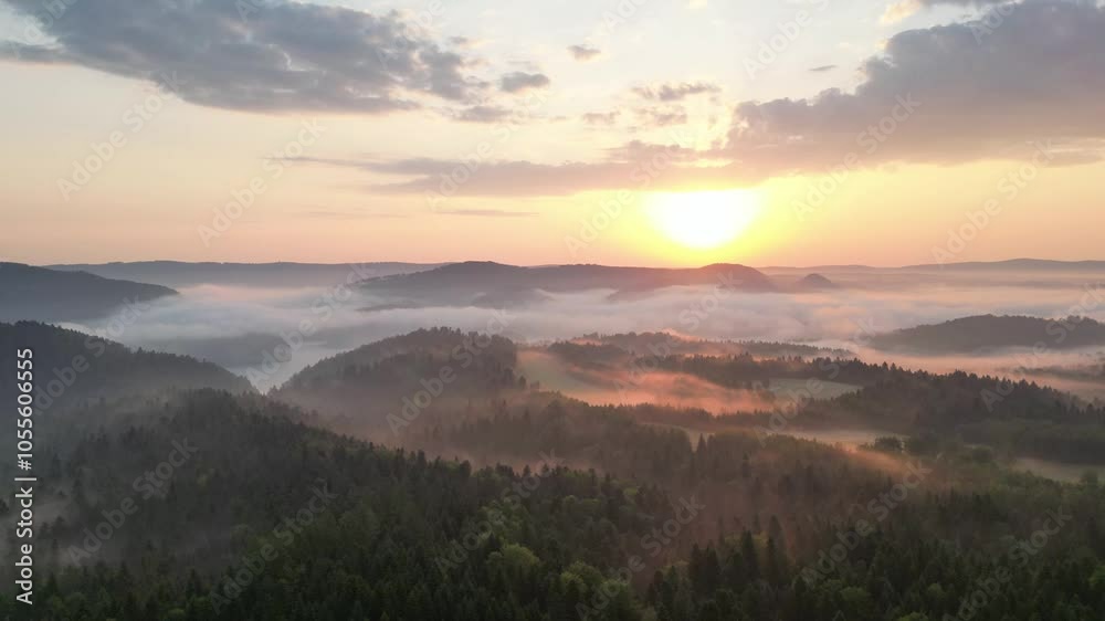 Drone hyperlapse among low mountains at sunrise. Low fog visible. Mavic 3 Drone hyperlapse among low mountains at sunrise. Low fog visible. Mavic 3
