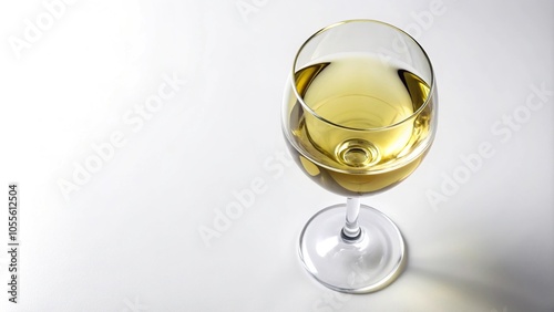Glass of white wine isolated on white background aerial view