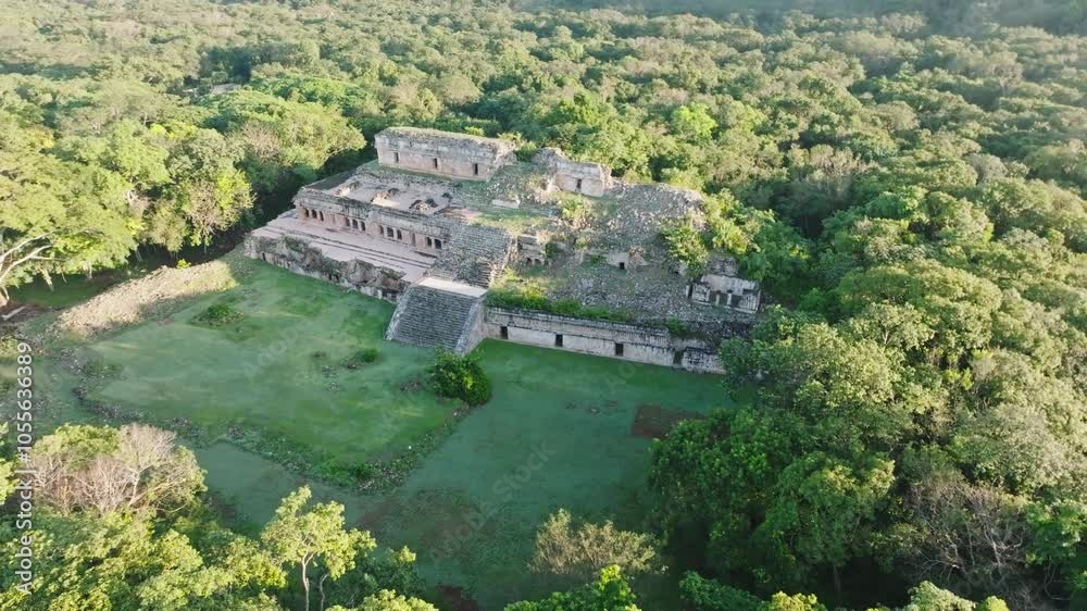 Aerial view of ancient maya ruins and temple surrounded by lush forest, Sayil, Yucatan, Mexico. Aerial view of ancient maya ruins and temple surrounded by lush forest, Sayil, Yucatan, Mexico.
