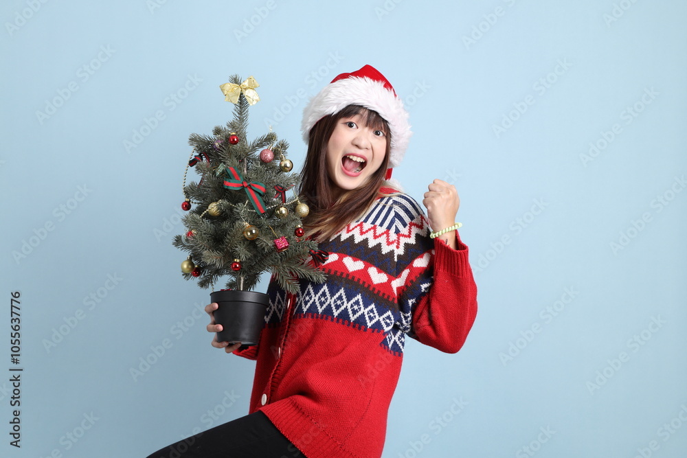 Woman wearing Santa hat Woman wearing Santa hat