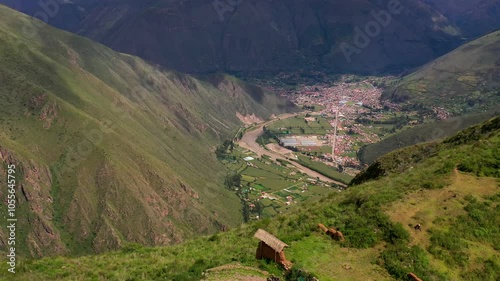 Aerial view of huchuy qosqo archaeological place surrounded by majestic mountains and serene valleys, Lamay, Peru. photo