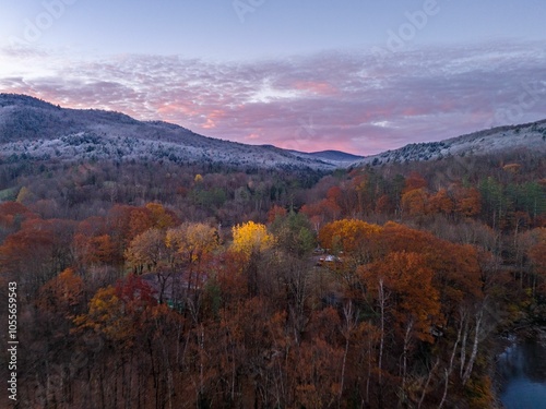 Autumn forest and sunset sky