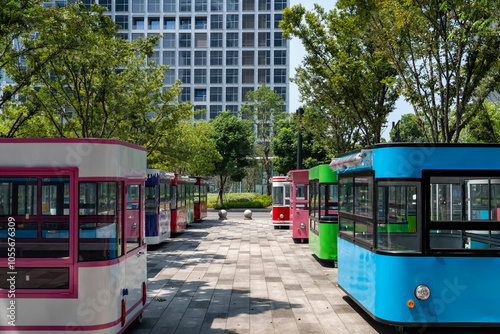 Quadro em tela Colorful fast food trucks in the city center park