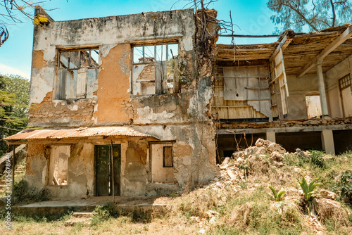 View of the architecture on the ruins of abandoned historical building in Old Stone Town Conservation Area in Bagamoyo, Tanzania 