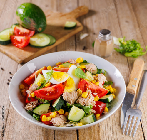 mixed vegetable salad with tomato, egg, tuna and cucumber. healthy food salad