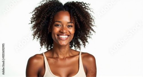 A Kenyan woman with a warm expression and natural curls