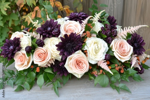 Elegant floral arrangement with roses dahlias for events