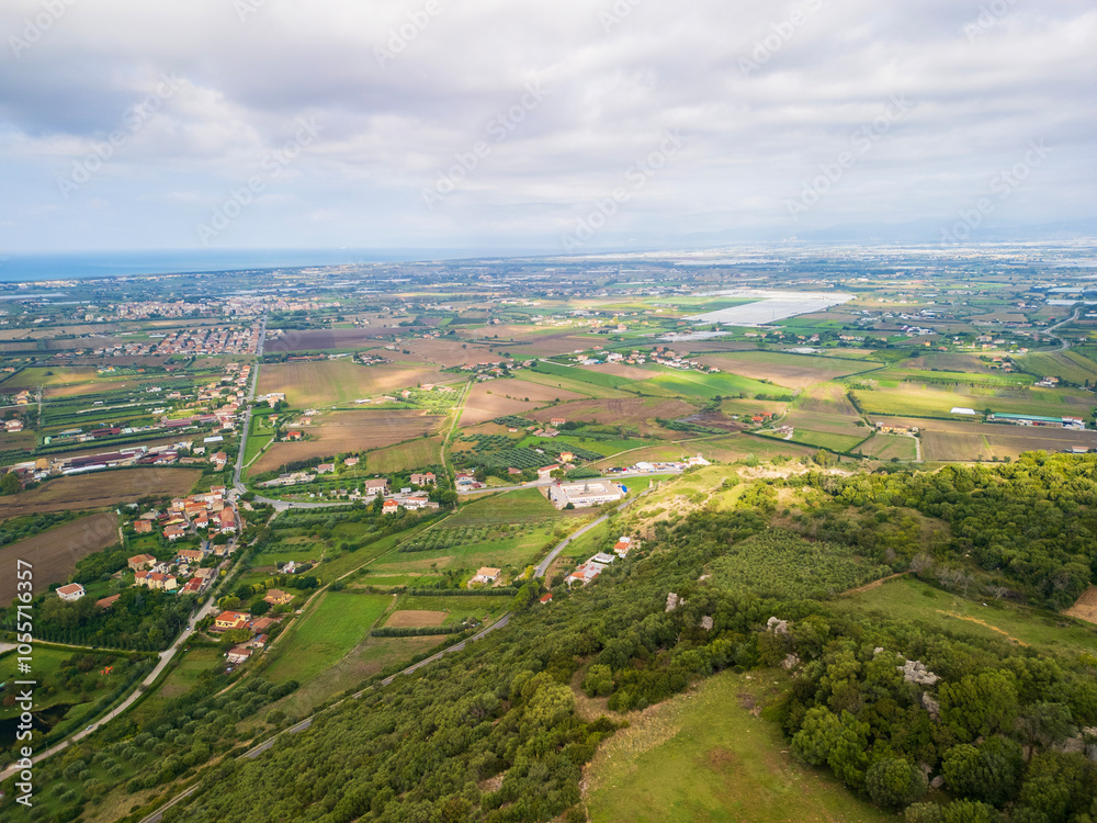 Fototapeta premium Italy, Campania, Paestum, Piana del Sele, aerial view of the Sele plain with its cultivated lands looking at the sea