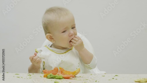 Little baby learns to eat, food diversification mess in the kitchen