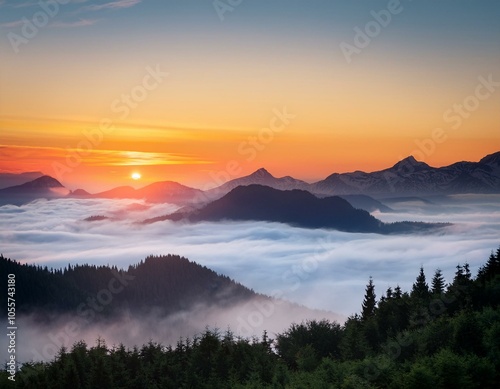 Colorful winter sunrise in the foggy mountains