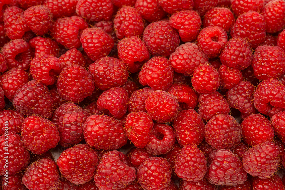 Tasty fresh raspberry as a background. Tasty fresh raspberry as a background.
