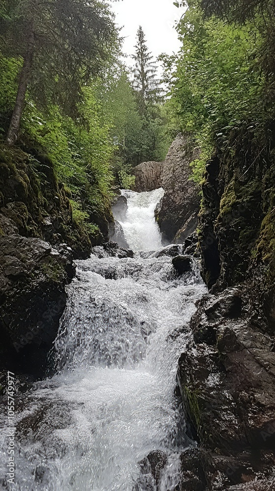 Cascading Waterfall in Rocky Landscape