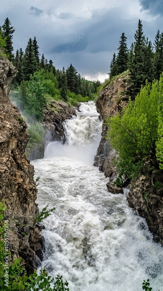 Thunderous Waterfall Surrounded by Lush Greenery Thunderous Waterfall Surrounded by Lush Greenery