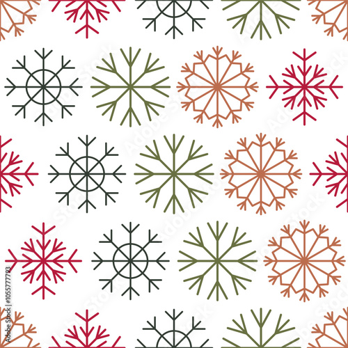 Red and green christmas snowflakes in seamless pattern on white background