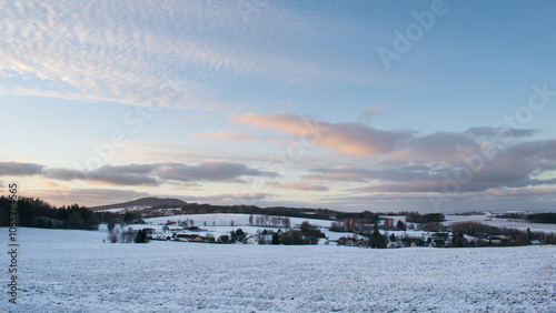 The ruins of Kumburk Castle offer a breathtaking view of the Czech landscape, blanketed in snow. photo