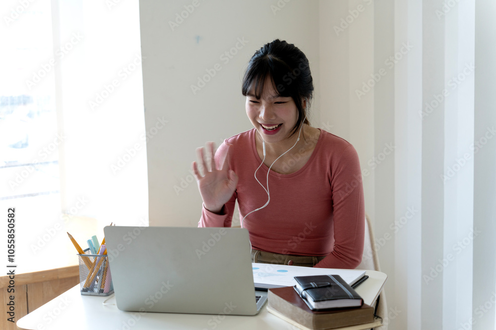 Young teenage woman is communicating or studying Young teenage woman is communicating or studying
