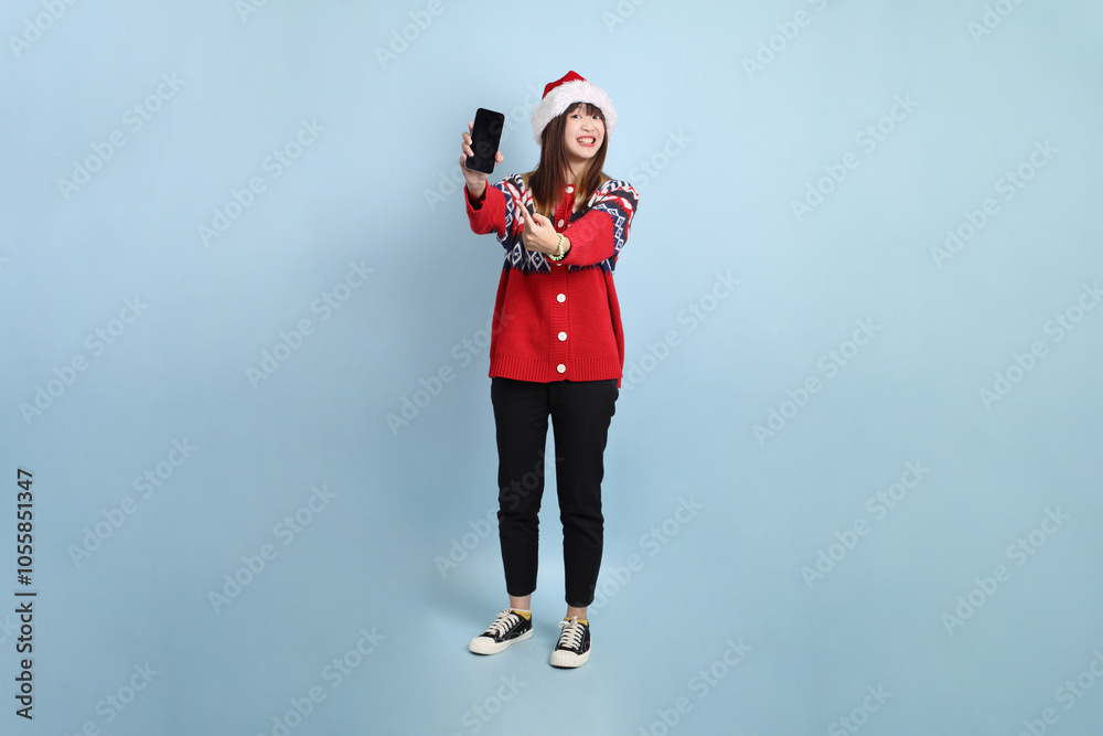 Woman wearing Santa hat Woman wearing Santa hat