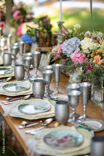 Romantic Outdoor Banquet with Floral Canopy and Chandeliers