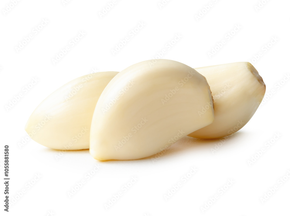 Side view of peeled garlic cloves in stack isolated on white background with clipping path Side view of peeled garlic cloves in stack isolated on white background with clipping path