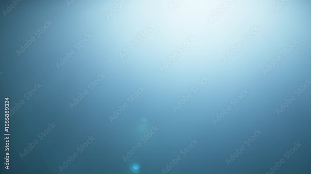 Blue light leaks and lens flares on black background.