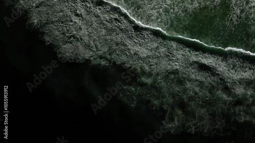 Nature video amazing ocean waves. Top-down aerial view of the powerful deep ocean waves, dark ocean. Night top view. Liquid background.
