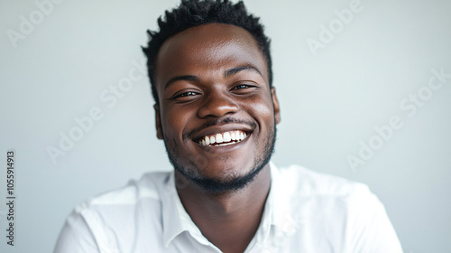 Friendly Black person smiling warmly