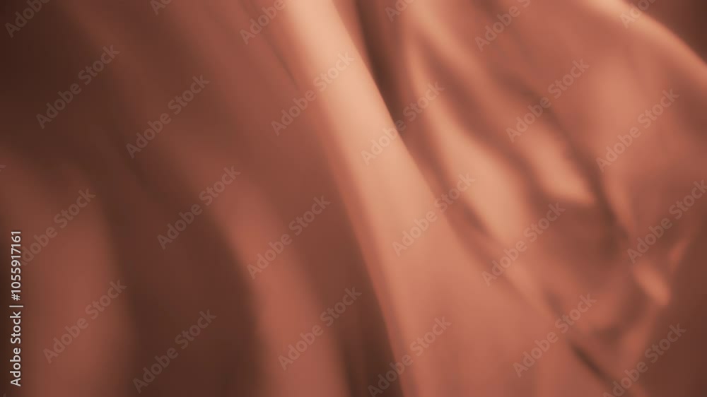 Wavy amber colored chiffon fabric flowing in the wind. Abstract texture background. Slow motion. Wavy amber colored chiffon fabric flowing in the wind. Abstract texture background. Slow motion.