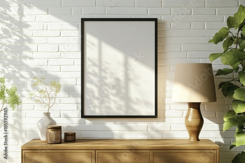 Wall art empty picture frame mockup on wooden desk, wall, table. Vase with olive branches, cactus. Elegant working space, home office concept.	
