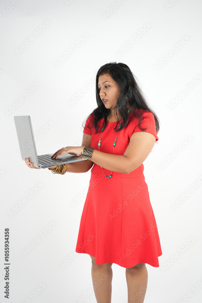 Happy pretty young woman holding laptop, smiling student girl with short hair using laptop online study standing isolated on white background. Happy pretty young woman holding laptop, smiling student girl with short hair using laptop online study standing isolated on white background.