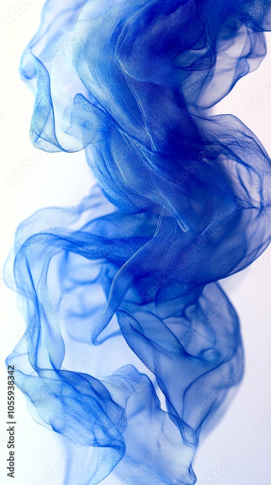 Flowing blue fabric, soft texture on a white isolate background. Flowing blue fabric, soft texture on a white isolate background.