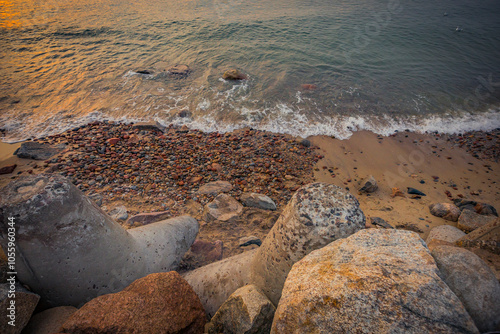 Fototapeta Naklejka Na Ścianę i Meble -  stones on the shore of the Baltic Sea after sunset