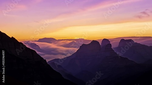 rock looping Sunrise 4k background mountains Seamless video time-lapse animation nature natural sun sunlight ray dusk evening summer spring butterfly insect mountain hill vale footage animated timela