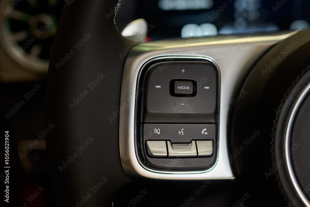 The modern cars steering wheel control panel boosts convenience and performance The modern cars steering wheel control panel boosts convenience and performance