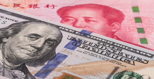 Fotografie 100 US dollar and 100 Chinese yuan