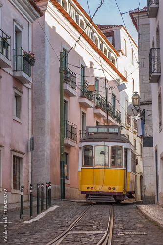 A charming yellow tram navigates the winding streets of Lisbon, Portugal, as the sun sets, highlighting the historic architecture surrounding the route