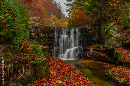 Fototapeta Naklejka Na Ścianę i Meble -  waterfall in autumn forest in Krkonose mountains