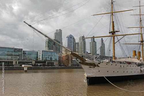 The boat standing in the harbor of Buenos Aires with skyscrapers in the background