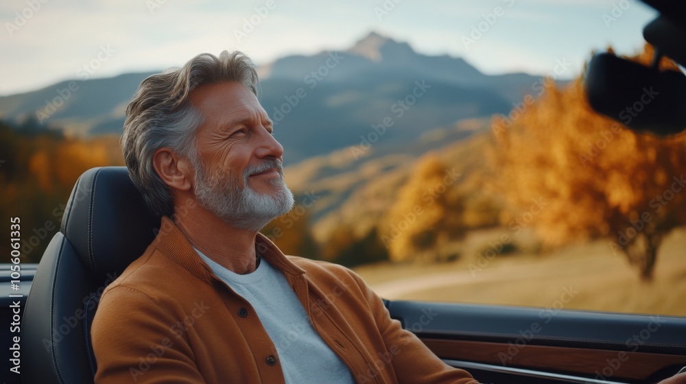 Fototapeta premium Retired Businessman Enjoying Scenic Mountain Drive